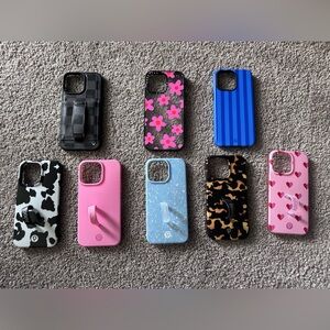Assorted iPhone 14 Pro Max phone cases - Loopy, Caseify, Walli
